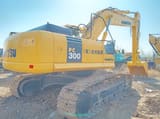 2022 Komatsu PC300 crawler excavator rear three-quarter view