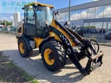 2015 JCB 409 wheel loader, front three-quarter view