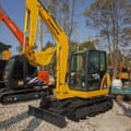 2024 Komatsu PC56 excavator, front three-quarter view