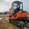 Hitachi ZX50U mini excavator, rear three-quarter view