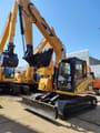 2011 Caterpillar 312C crawler excavator, front three-quarter view
