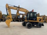 2021 Caterpillar M315D wheel excavator, side view