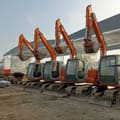 2008 Hitachi EX60-5 mini excavators in a row