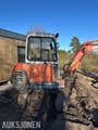 1999 Kubota KX91-2 mini excavator, rear three-quarter view