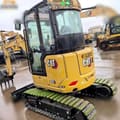 2025 Caterpillar 303CR mini excavator, rear three-quarter view