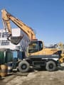 2018 Hyundai 210W-9T wheel excavator side view