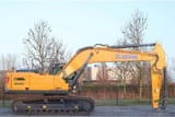 2023 XCMG XE300E Crawler Excavator with a yellow boom and arm extended, showcasing the full machine profile.