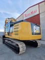 2015 Caterpillar 329E crawler excavator, rear three-quarter view
