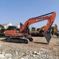 2024 Doosan DX300LC-9C crawler excavator, side profile view