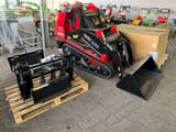 2022 Toro DINGO TX1000 mini excavator with attachments, high-angle view