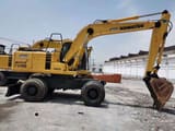 2015 Komatsu PW150-6 wheeled excavator side view