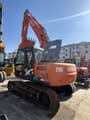 2022 Hitachi Zaxis 120 crawler excavator, rear three-quarter view