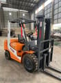 2024 TCM FD 30 forklift, rear three-quarter view