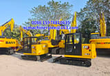 2025 Caterpillar 305.5 mini excavator, side view