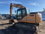 2011 Case CX130B excavator, side view