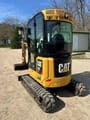 2019 Caterpillar 302 NG mini excavator, rear three-quarter view