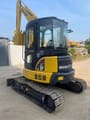 2022 Komatsu PC-55MR mini excavator, front three-quarter view