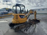 2018 Caterpillar 302.7DCR crawler excavator, rear three-quarter view