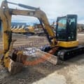 2018 Caterpillar 305.5E mini excavator, side view