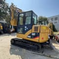 2022 Caterpillar 306D mini excavator, rear three-quarter view