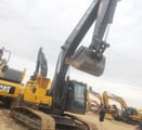 Volvo EC300 crawler excavator, low-angle side view