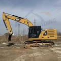 Caterpillar 320GC rupsgraafmachine uit 2018, zijaanzicht