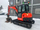 2020 Kubota U55-4 mini excavator, rear three-quarter view
