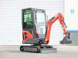 2025 Müller Machinery MB 16-VKSH Mini Excavator with its red boom and arm extended forward, featuring a black bucket and a front dozer