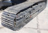2026 JCB 225LC ECO PLUS Crawler Excavator showing a detailed view of its black track assembly.