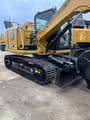 2024 Caterpillar 307E2 mini excavator, rear three-quarter view