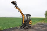 2025 APS KME20 Mini Excavator with its boom fully extended upwards and the bucket angled.