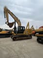 2024 Caterpillar 330 crawler excavator, side view