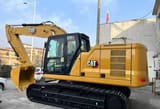 2025 Caterpillar 320GC crawler excavator, side profile view