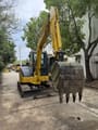2012 Komatsu PC-55MR mini excavator, front view with bucket