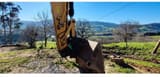 2014 Caterpillar 320EL crawler excavator bucket and boom detail