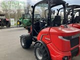 2023 Manitou MLA 3-25 H mini excavator, rear three-quarter view