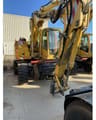 2013 Atlas 1404 ZW wheel excavator, front three-quarter view