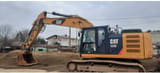 2014 Caterpillar 323EL crawler excavator side view