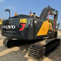 Volvo EC240 crawler excavator, rear three-quarter view