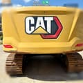 2023 Caterpillar 320GC crawler excavator, rear view