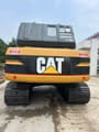2023 Caterpillar 320BL crawler excavator, rear view