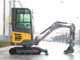 2025 Müller Machinery MB 20-KSH Mini Excavator from the side, highlighting its dark gray undercarriage and tracks.