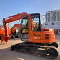Hitachi Zaxis 75US crawler excavator, side view