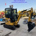 2024 Caterpillar 302 mini excavator, three-quarter view
