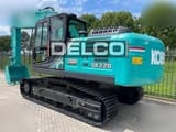 2026 Kobelco SK220 crawler excavator, rear three-quarter view