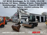 2010 Caterpillar M316D wheel excavator, front three-quarter view