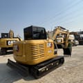 2023 Caterpillar 305.5E2 mini excavator rear three-quarter view