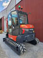 2022 Kubota KX060-5 mini excavator, front three-quarter view