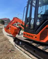 Hitachi ZAXIS 50U mini excavator, side view