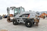 2009 Caterpillar M313D wheel excavator, side view